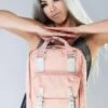 Monet Series Macaroon Backpack In Pink 1 Monet Series Macaroon Backpack In Pink -Doughnut Doughnut Officials D010MN 0088 F Monet Series Pink Macaroon Rave Festival Backpack PNK m
